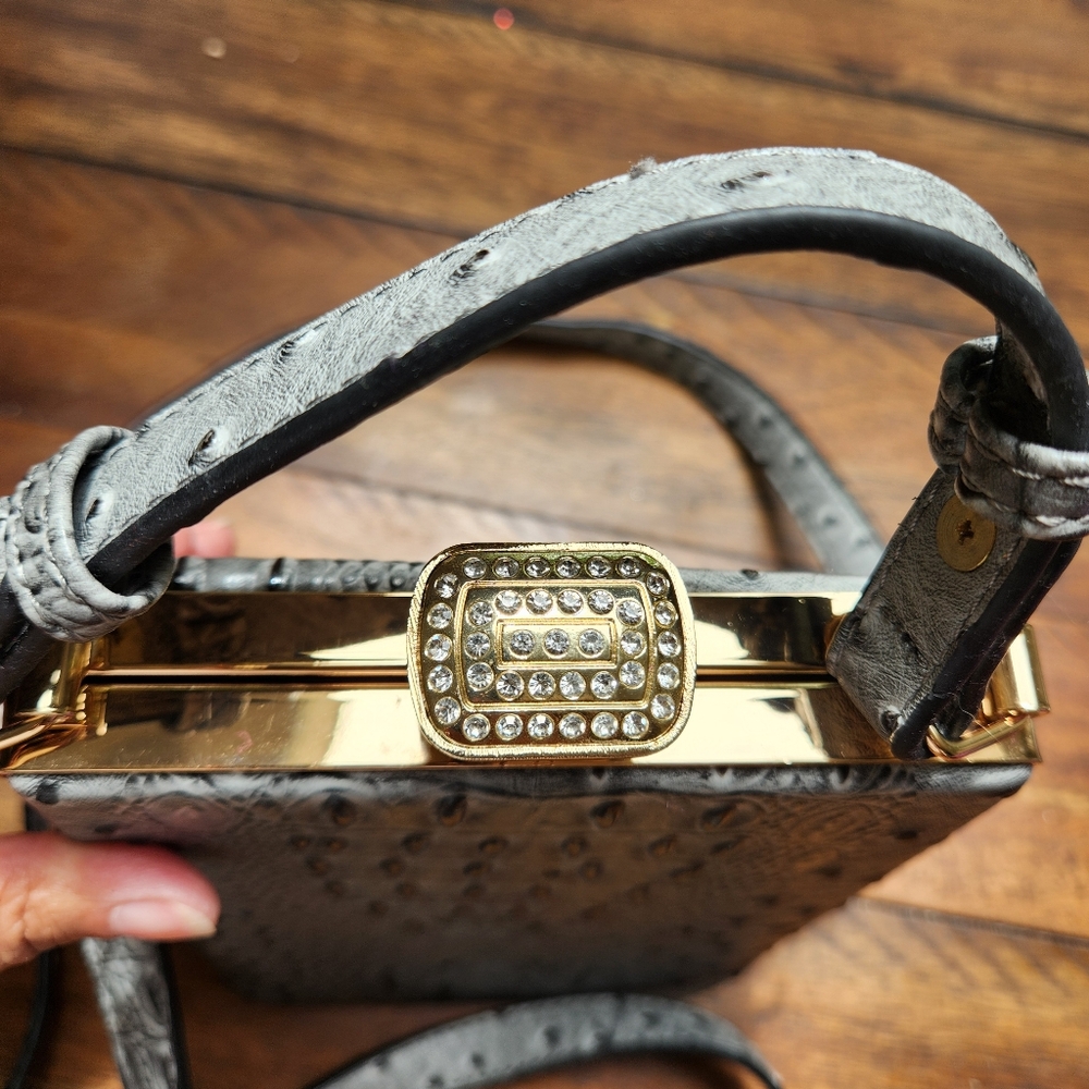 Isabelle NWT vegan crossbody/sachel Gray with handle and adjustable strap.